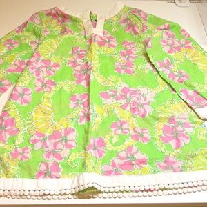 Green blouse with pink flowers and sea horses for girls ages 4 to 5 years old.